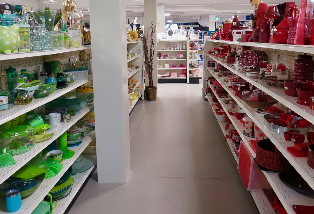 Colour-coordinated bric-a-brac shelves at the Salvation Army Thrift Store.